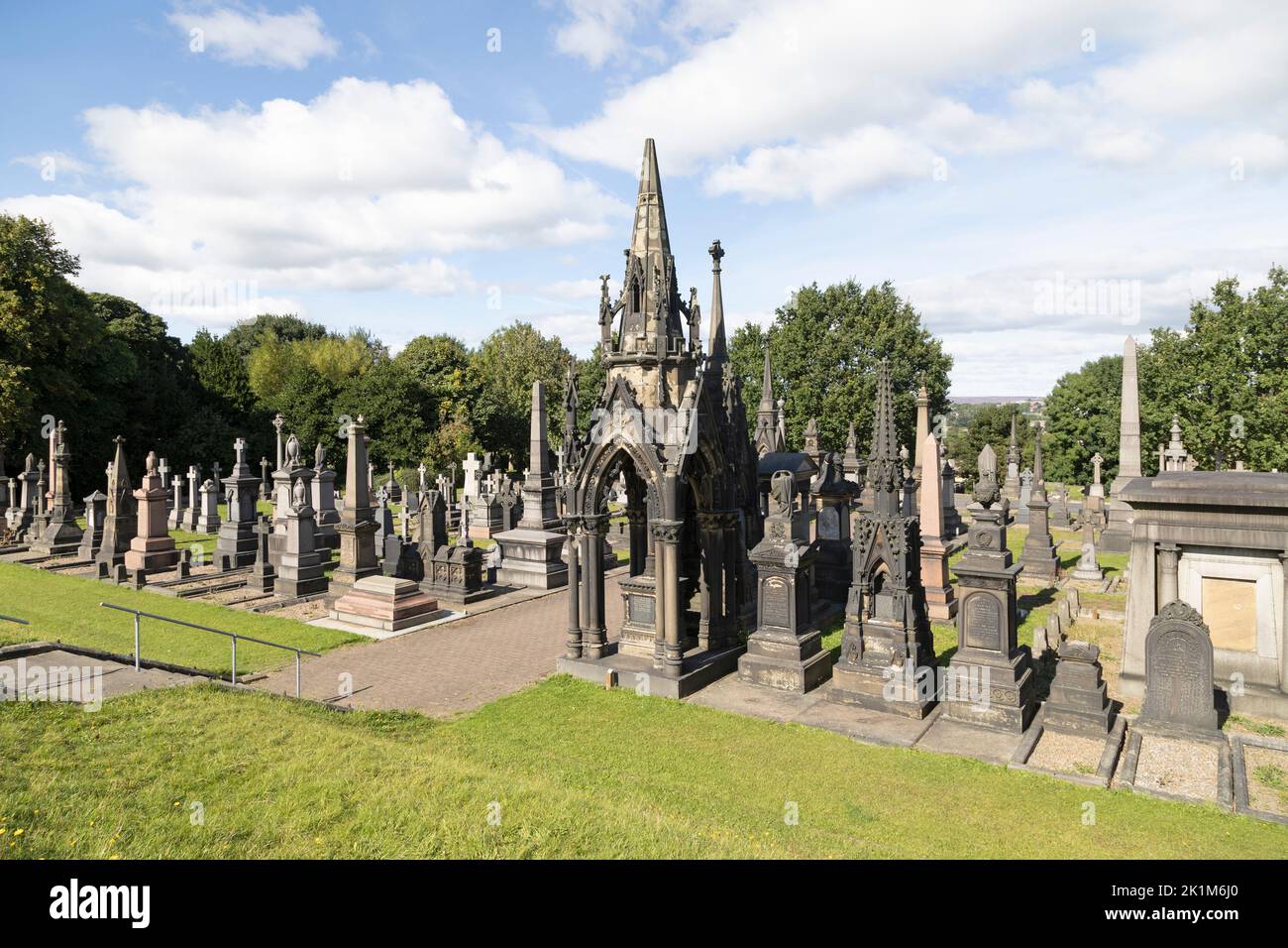 Graves and monuments at Undercliffe Cemetery in Bradford, West Yorkshire. Bradford has been named the UK City of Culture 2025 and in 2009 was named th Stock Photo