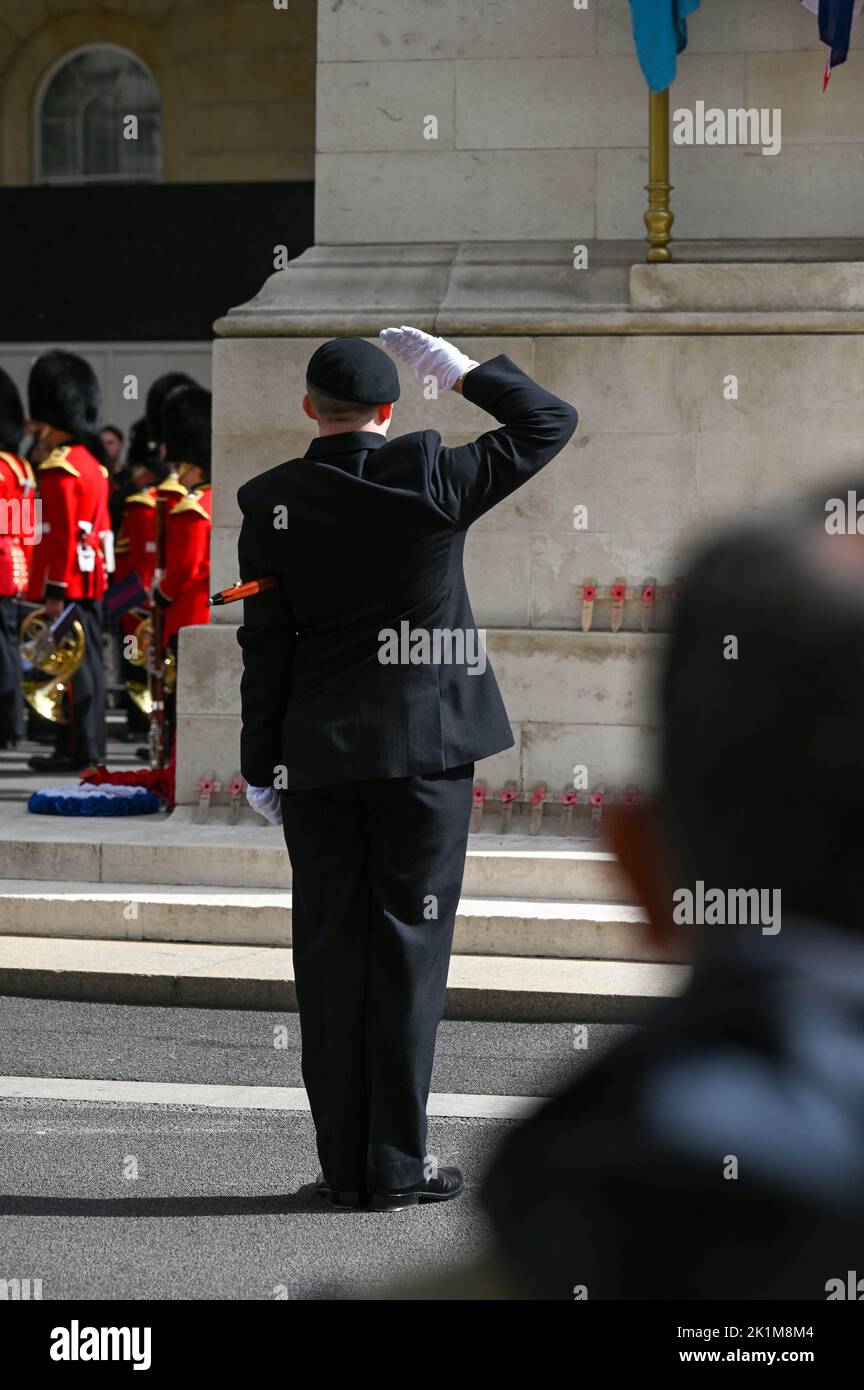 London, UK. 19th Sep, 2022. London UK 19th September 2022 - A salute for the Queen during the funeral procession of Queen Elizabeth II in London today: Credit Simon Dack / Alamy Live News Credit: Simon Dack News/Alamy Live News Stock Photo