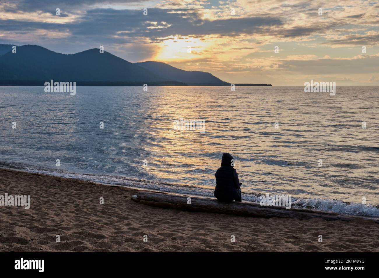 Barguzinsky Bay of Lake Baikal, Russia. Silhouette of alone person ...