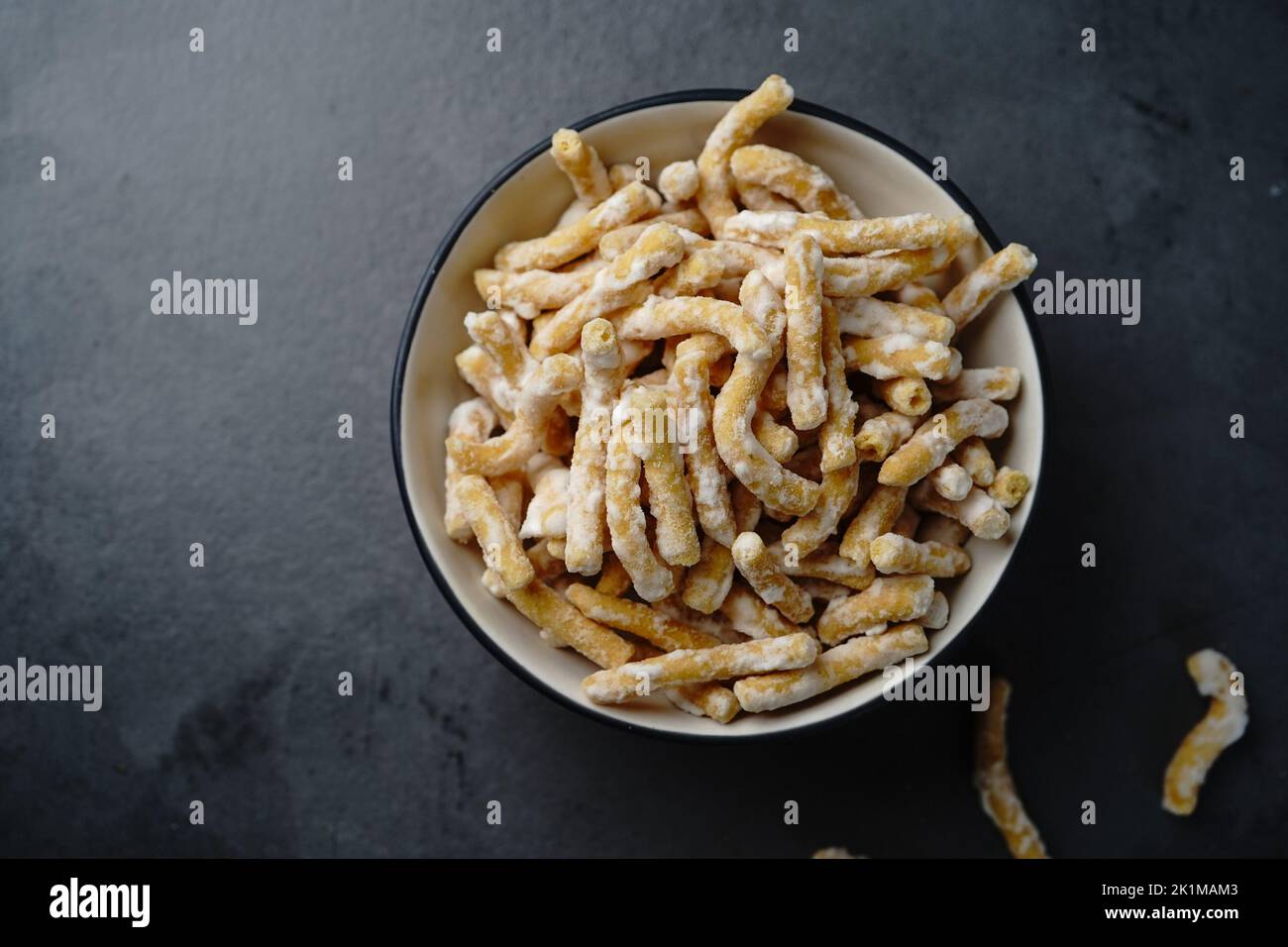 Sweet sev seerni seeni or madhura seva deep fried Diwali snack with chickpea flour, selective