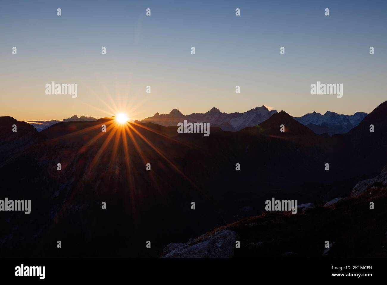 sunrise with Eiger Mönch and Jungfrau seen from Diemtigtal Stock Photo