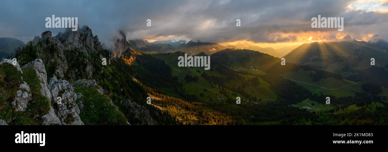 dramatic sunset panorama at the rugged peaks of Gastlosen in the alpine foothills of Fribourg Stock Photo