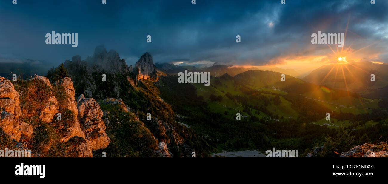 dramatic sunset panorama at the rugged peaks of Gastlosen in the alpine foothills of Fribourg Stock Photo