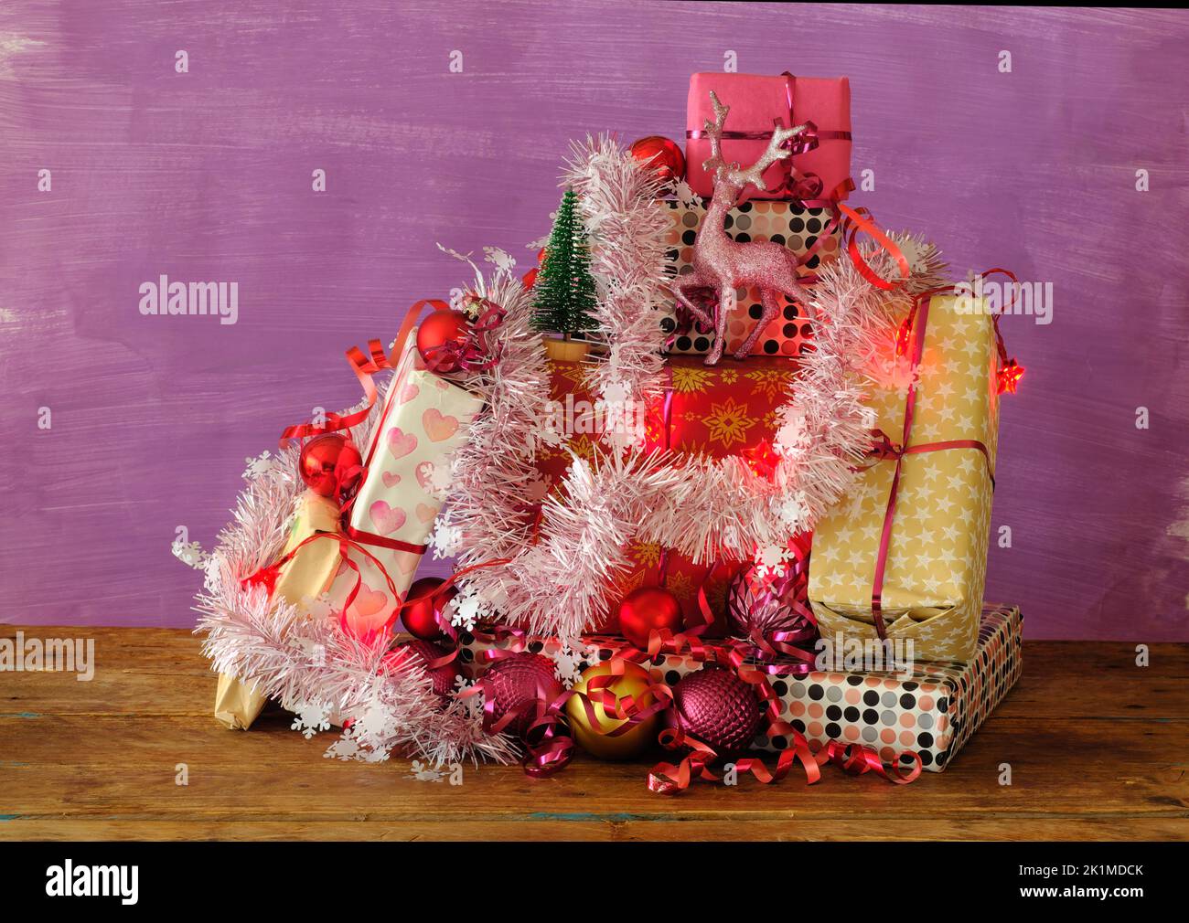 Heap of christmas gifts,with decoration,christmas balls and lights. Christian holiday and clebration concept Stock Photo