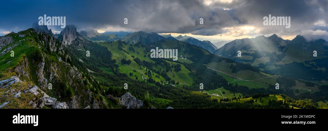 dramatic afternoon panorama at the rugged peaks of Gastlosen in the alpine foothills of Fribourg near Gruyeres Stock Photo
