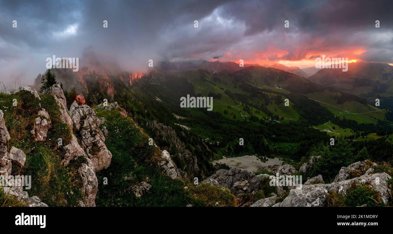 dramatic sunset at the peaks of Gastlosen in the swiss alps in the last light Stock Photo