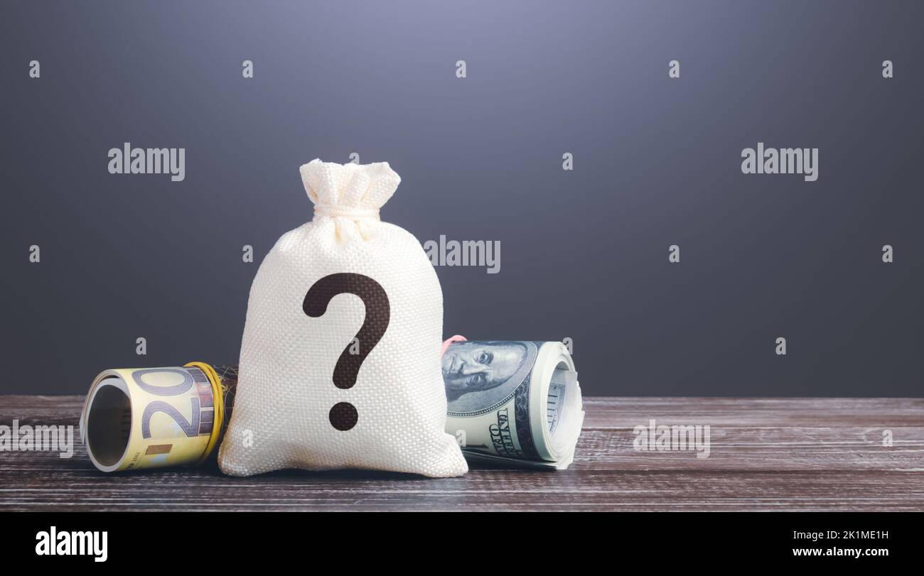 Money bag with a question mark. Source origin of money and income. Political promises and populism. Audit and accounting. Obscurity and banking secrec Stock Photo