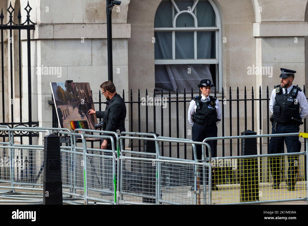 London, UK. 19 September 2022. An artist, probably official, at work