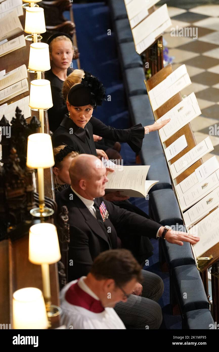 Mia Tindall (top), Zara Tindall (centre) and Mike Tindall (second bottom) at the Committal Service for Queen Elizabeth II held at St George's Chapel in Windsor Castle, Berkshire. Picture date: Monday September 19, 2022. Stock Photo