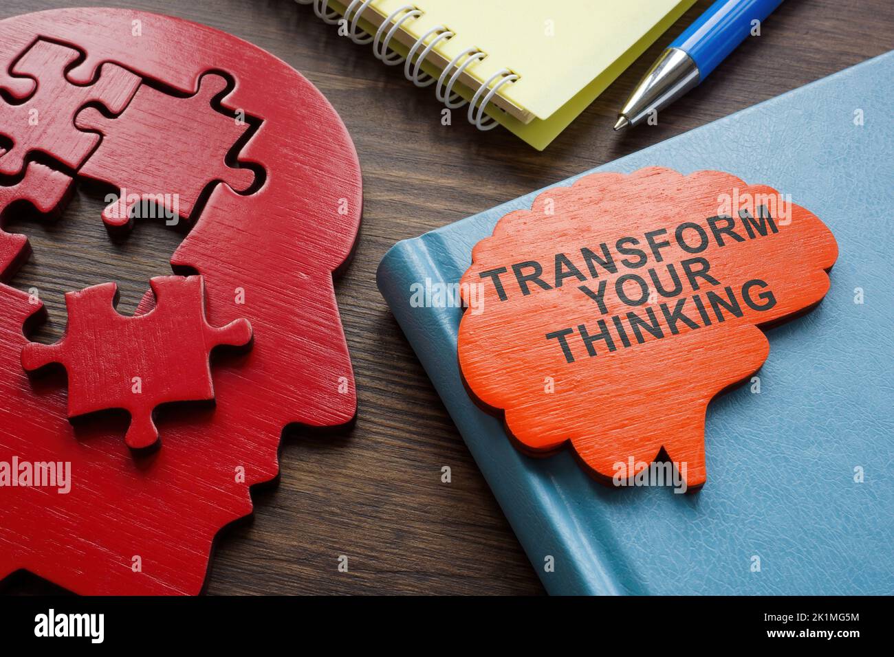 Transform your thinking sign on the brain and puzzle. Stock Photo