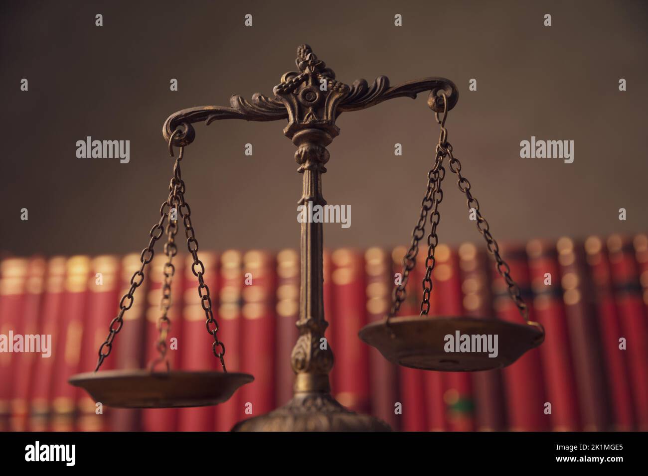 bronze law statue represented by scale signifying impartiality and two