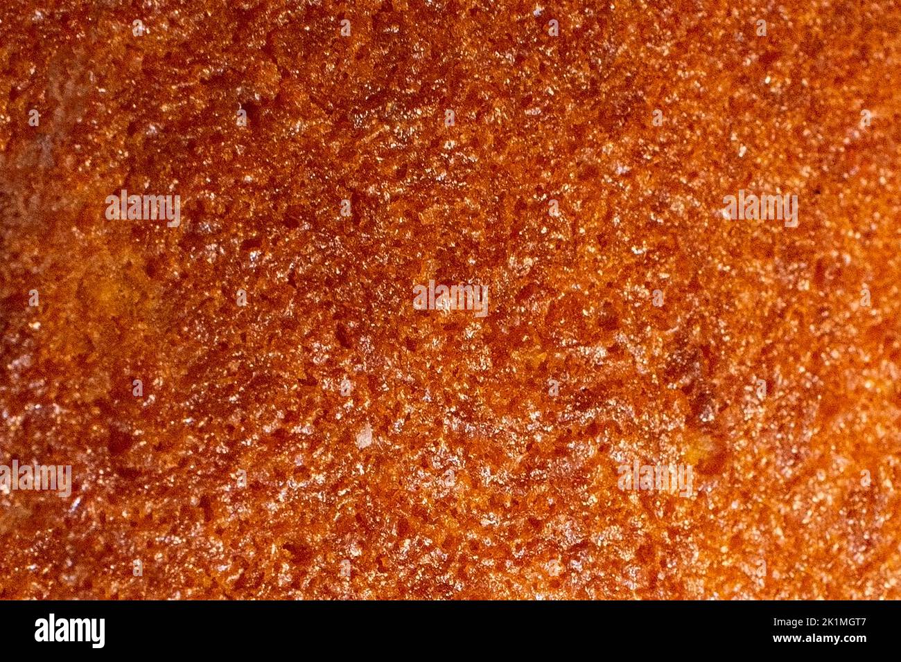 Brown abstract rough sandpaper texture with grain details Stock Photo