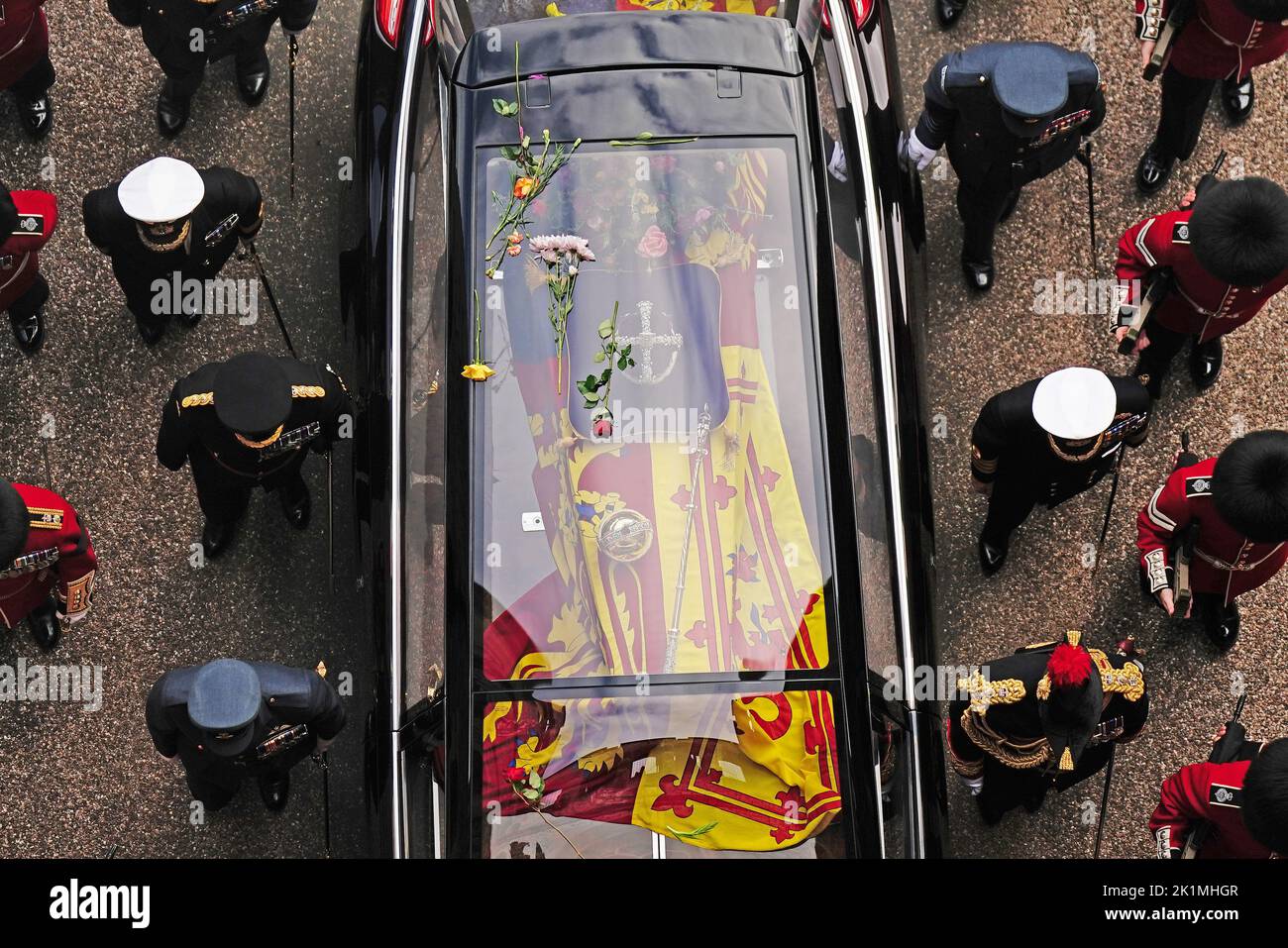 Flowers on the hearse carrying the coffin of Queen Elizabeth II as it arrives at Windsor Castle for the Committal Service in St George's Chapel. Picture date: Monday September 19, 2022. Stock Photo