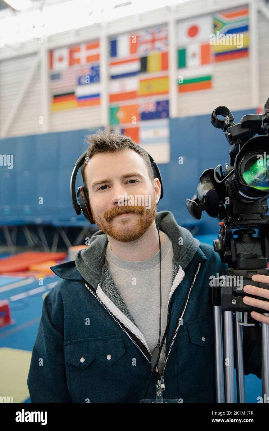 tv-cameraman-with-camera-in-sports-hall-stock-photo-alamy