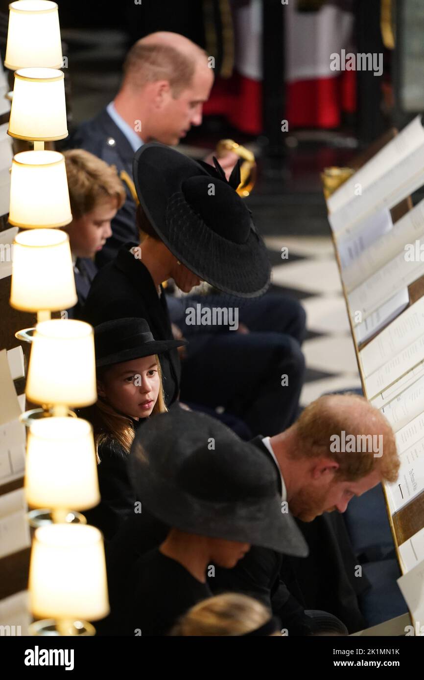 (Top to bottom) The Prince of Wales, Prince George, the Princess of Wales, Princess Charlotte, the Duke of Sussex and Duchess of Sussex at the Committal Service for Queen Elizabeth II held at St George's Chapel in Windsor Castle, Berkshire. Picture date: Monday September 19, 2022. Stock Photo
