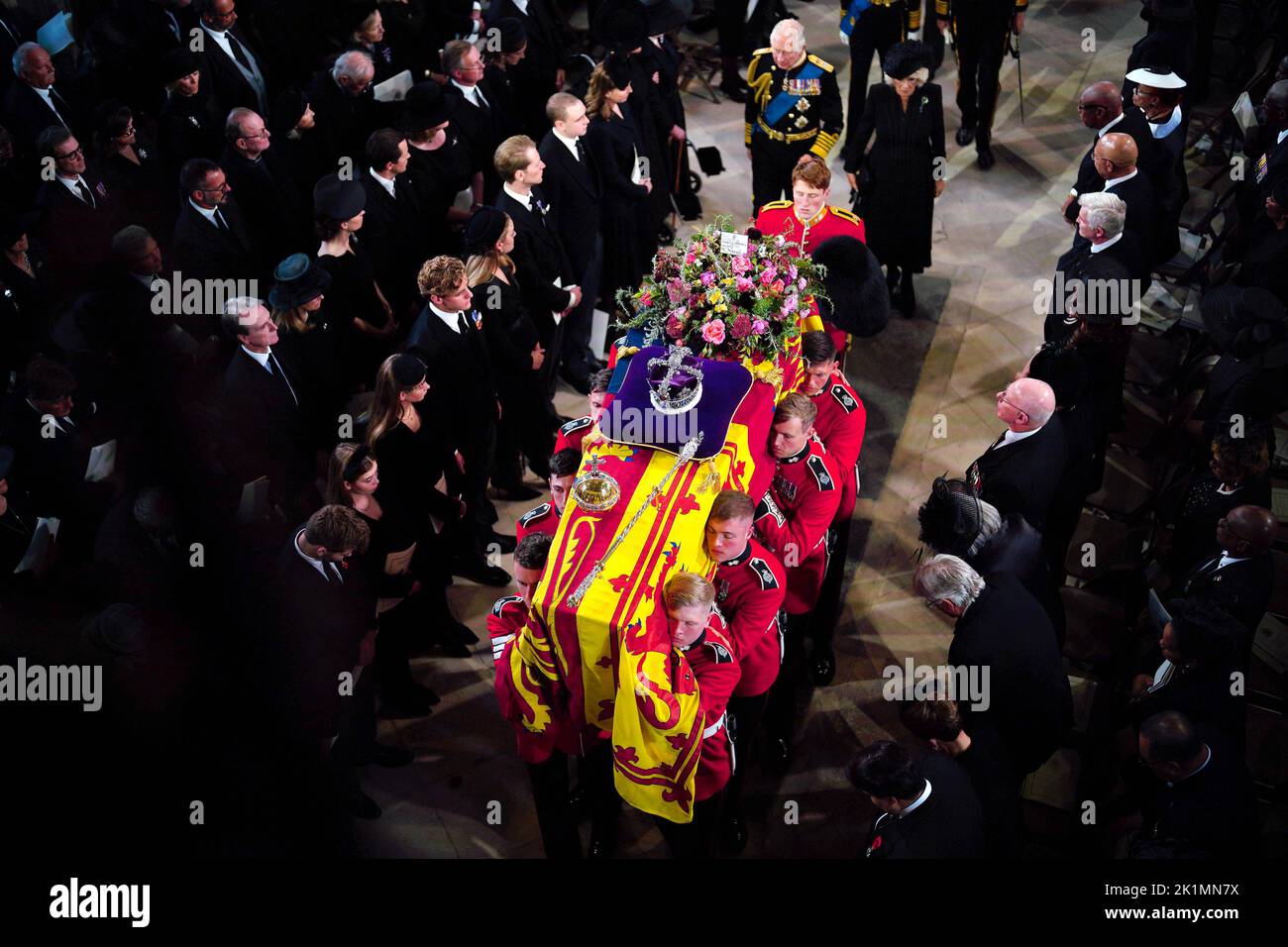 King Charles III and the Queen Consort follow behind the coffin of Queen Elizabeth II as it is carried into St George's Chapel in Windsor Castle, Berkshire for her Committal Service. Picture date: Monday September 19, 2022. Stock Photo