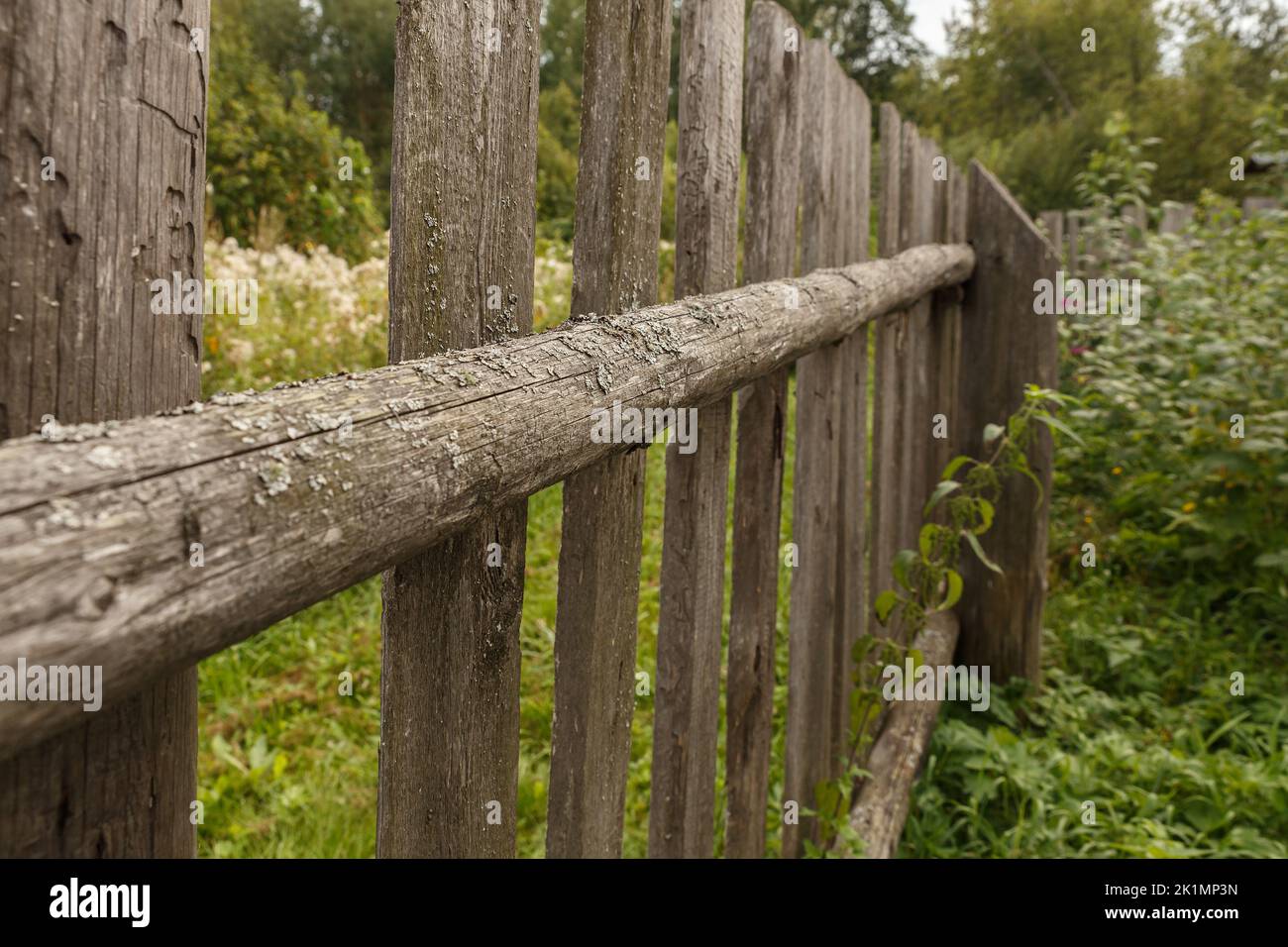 old wooden fence from boards. Fence element close-up Stock Photo - Alamy
