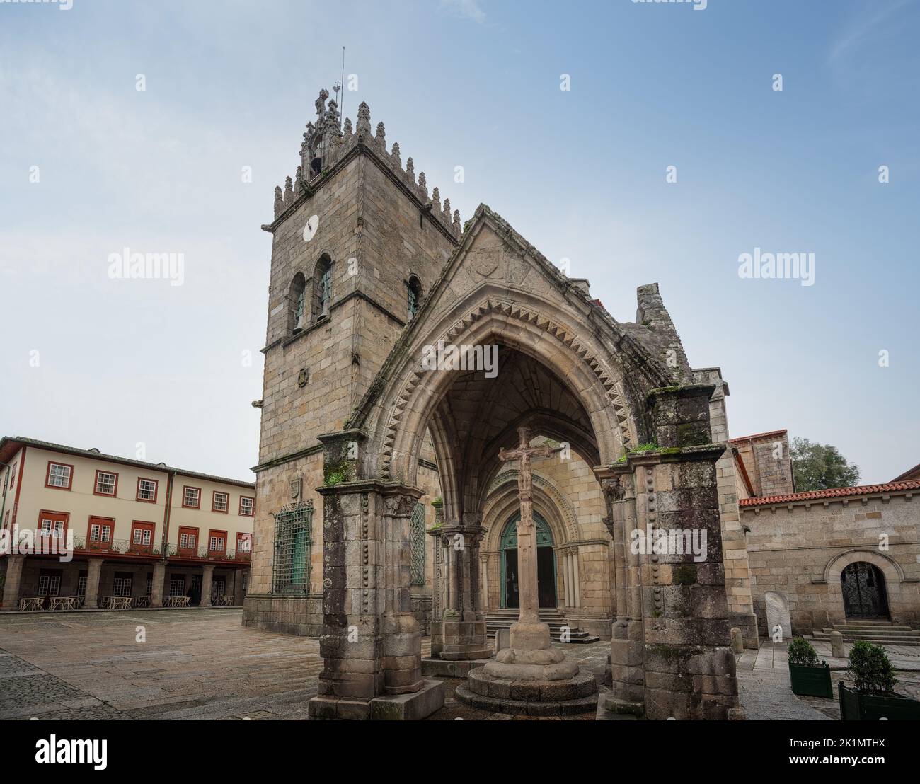 Gothic Battle of Salado Monument (Padrao do Saldo) and Nossa Senhora da Oliveira Church at Largo da Oliveira - Guimaraes, Portugal Stock Photo