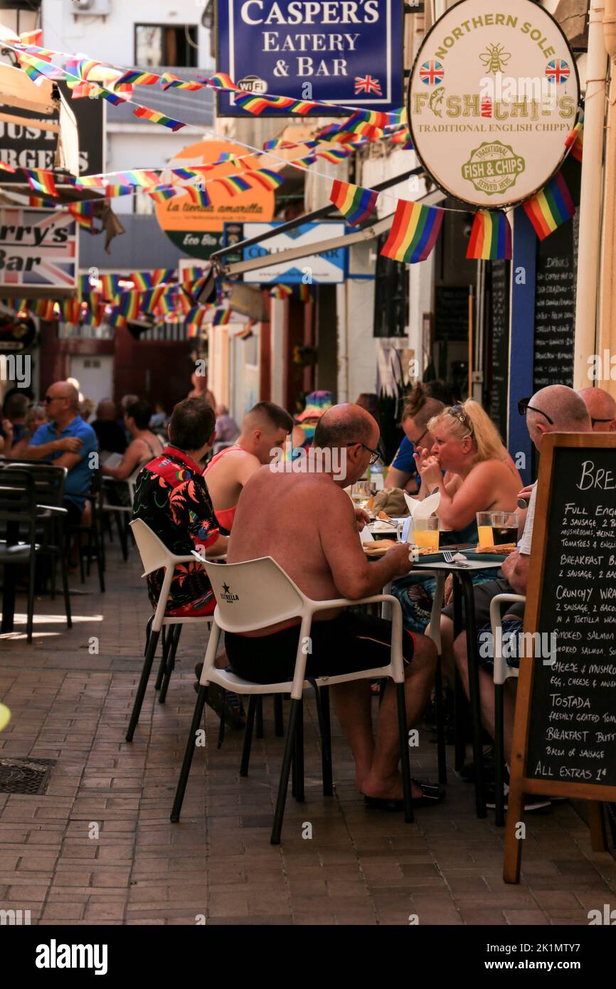 Benidorm, Alicante, Spain- September 10, 2022: Bars and terraces of typical spanish food full of people in the old town of Benidorm Stock Photo