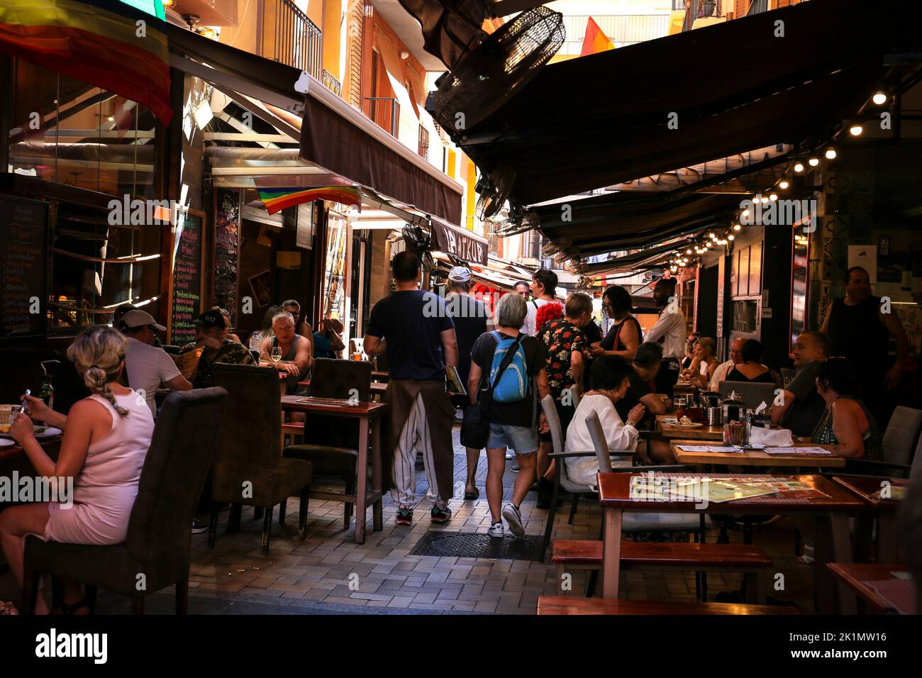 Benidorm, Alicante, Spain- September 10, 2022: Bars and terraces of typical spanish food full of people in the old town of Benidorm Stock Photo