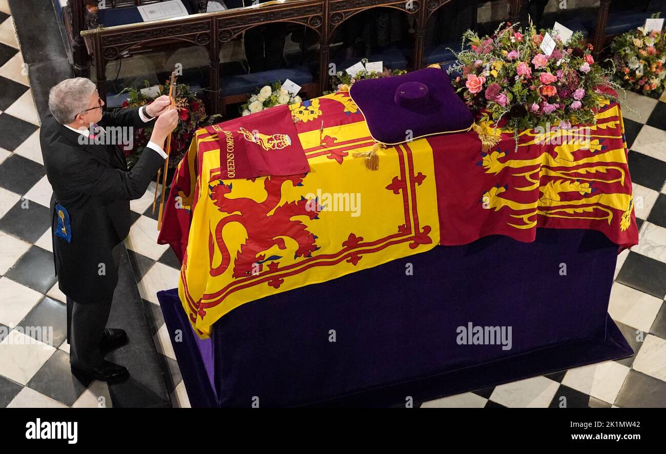 The Lord Chamberlain ceremonially breaks his Wand of Office on the