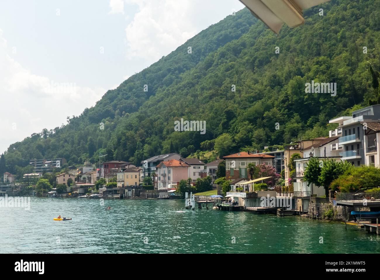 Ticino, Switzerland: Lake Lugano and the waterside commune of Melide Stock Photo