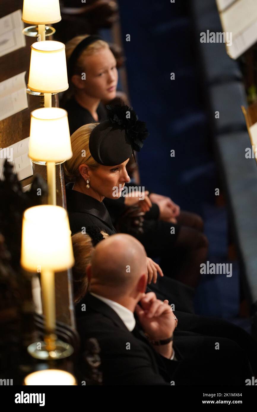 RETRANSMITTED CORRECTING NAMES TOP TO BOTTOM Savannah Phillips (top), Zara Tindall (centre) Mia Tindall (hidden) and Mike Tindall (second bottom) at the Committal Service for Queen Elizabeth II held at St George's Chapel in Windsor Castle, Berkshire. Picture date: Monday September 19, 2022. Stock Photo