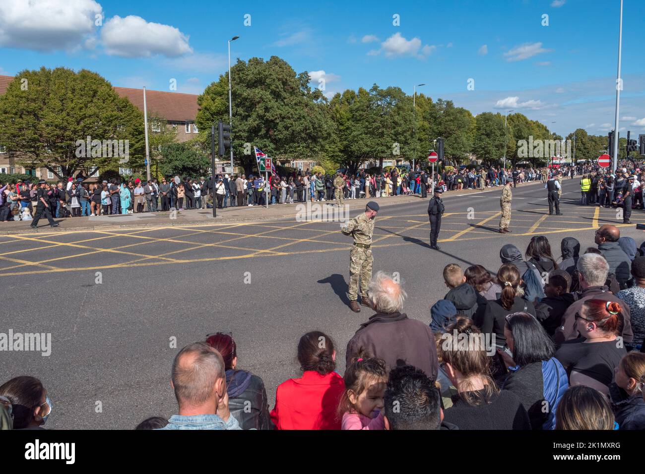 People waiting for the hearse containing Queen Elizabeth II on her way to being buried in St Georges Chapel, Windosor Castle, UK.. Stock Photo