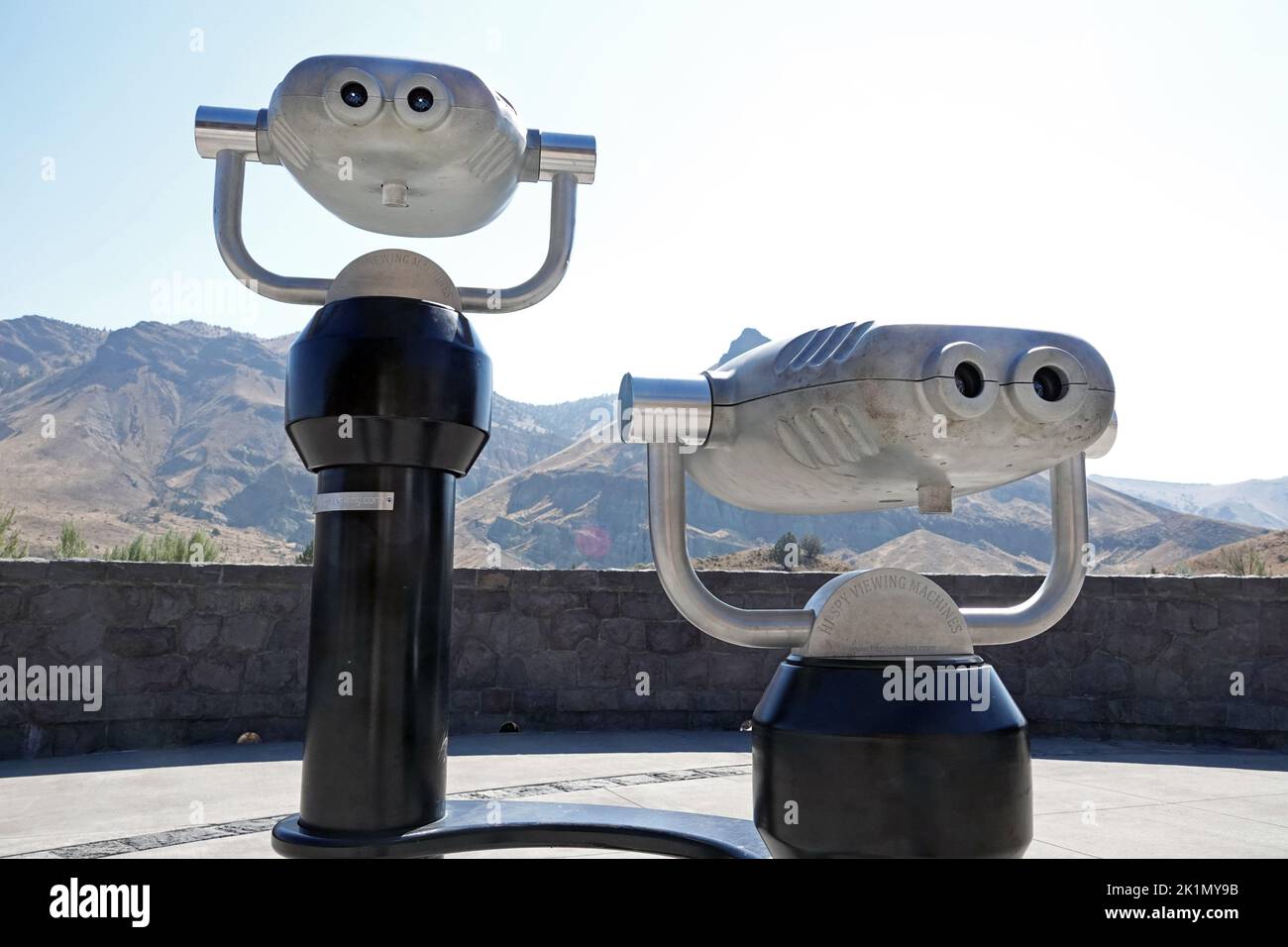 A pair of large binoculars, or viewing machines, at the visitor's center in John Day Fossil Beds National Monument, Sheep Rock Unit, in central Oregon. Stock Photo
