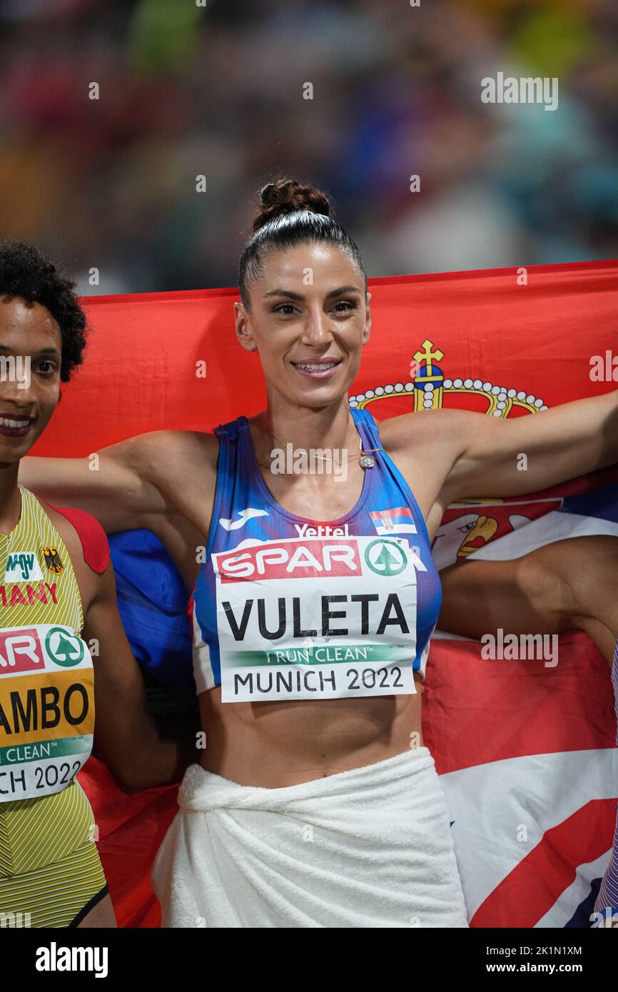 Ivana Spanovic with her country's flag as the winner of the long Jump