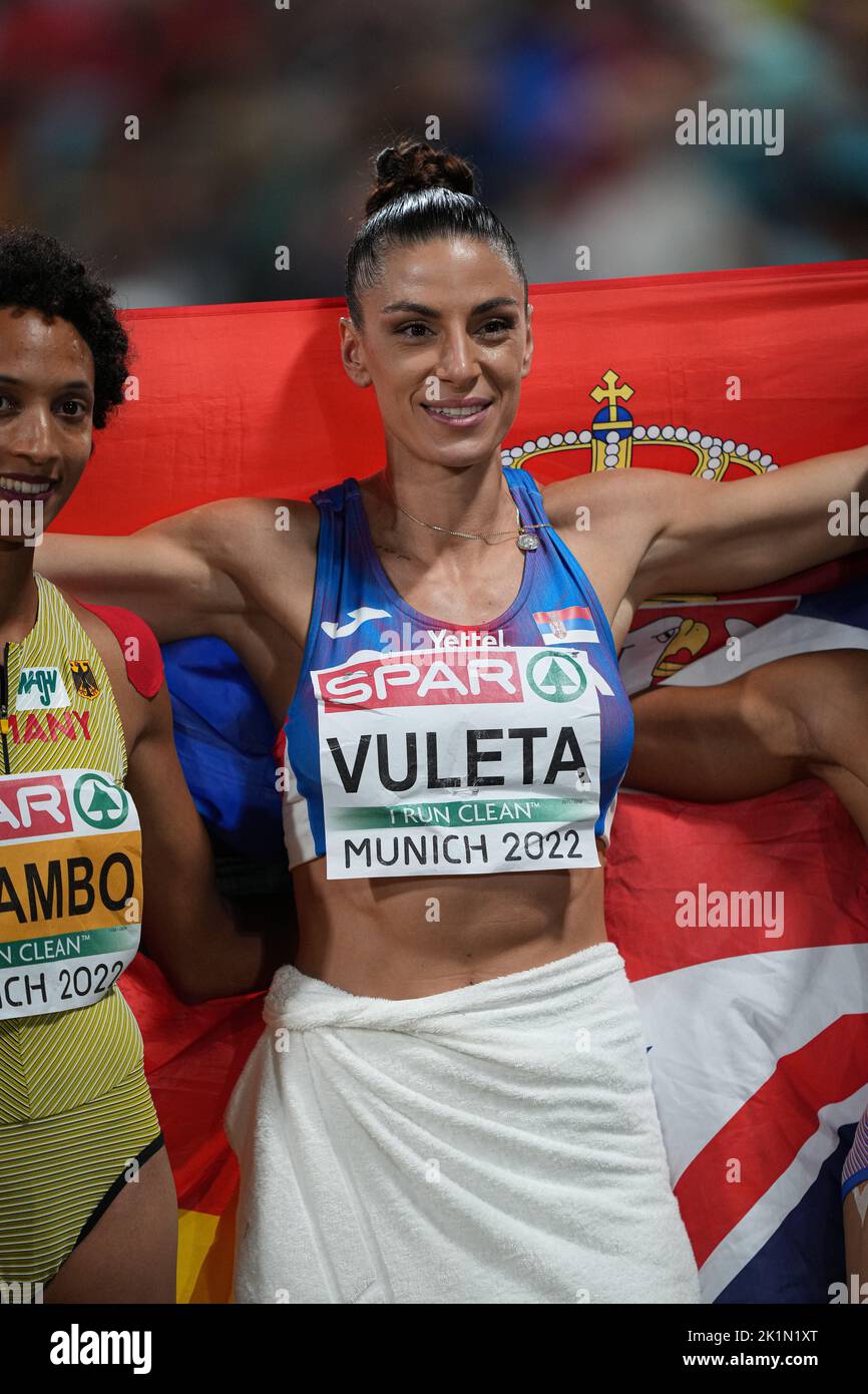 Ivana Spanovic with her country's flag as the winner of the long Jump
