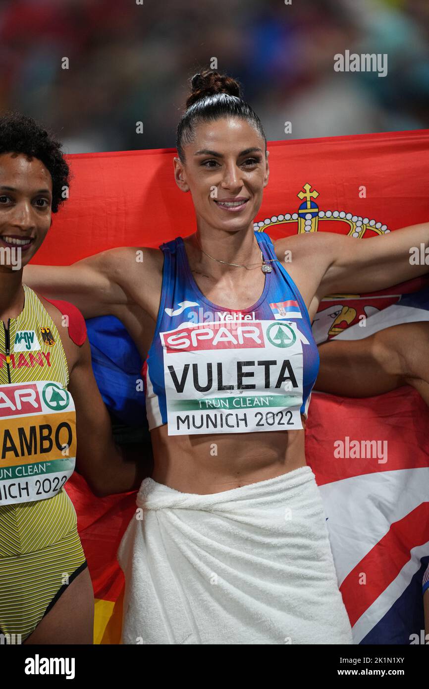 Ivana Spanovic with her country's flag as the winner of the long Jump