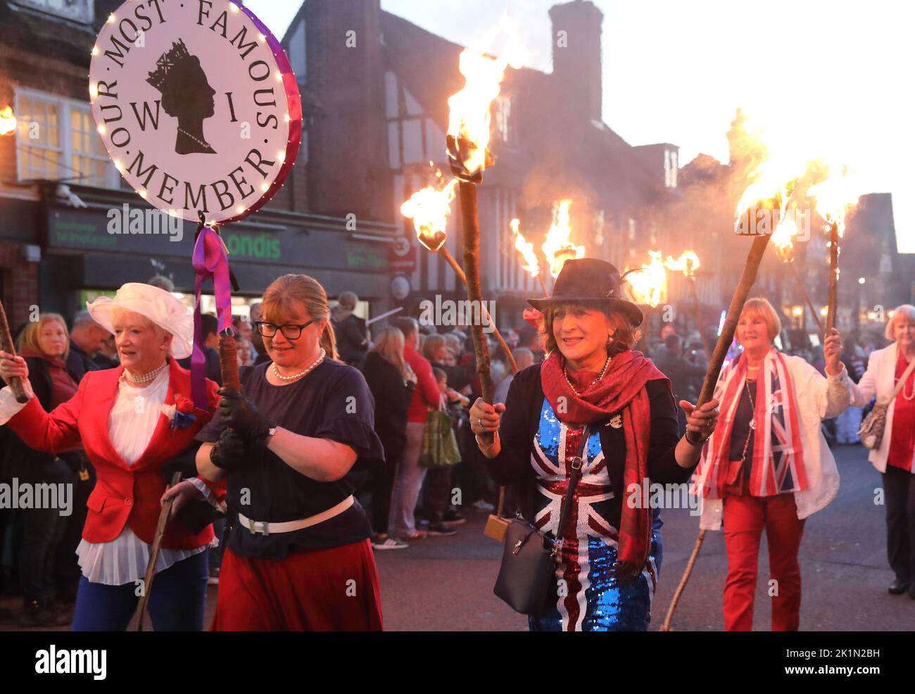 Remembering Queen Elizabeth II, in recognition of her recent death, at Mayfield's annual Bonfire Procession Carnival, when Protestant martyrs, burnt at the stake under Queen Mary are remembered, in East Sussex, England, UK Stock Photo