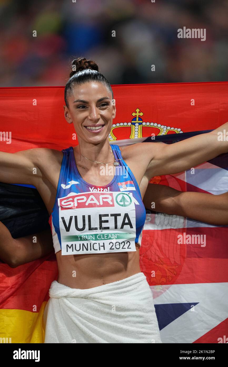 Ivana Spanovic with her country's flag as the winner of the long Jump