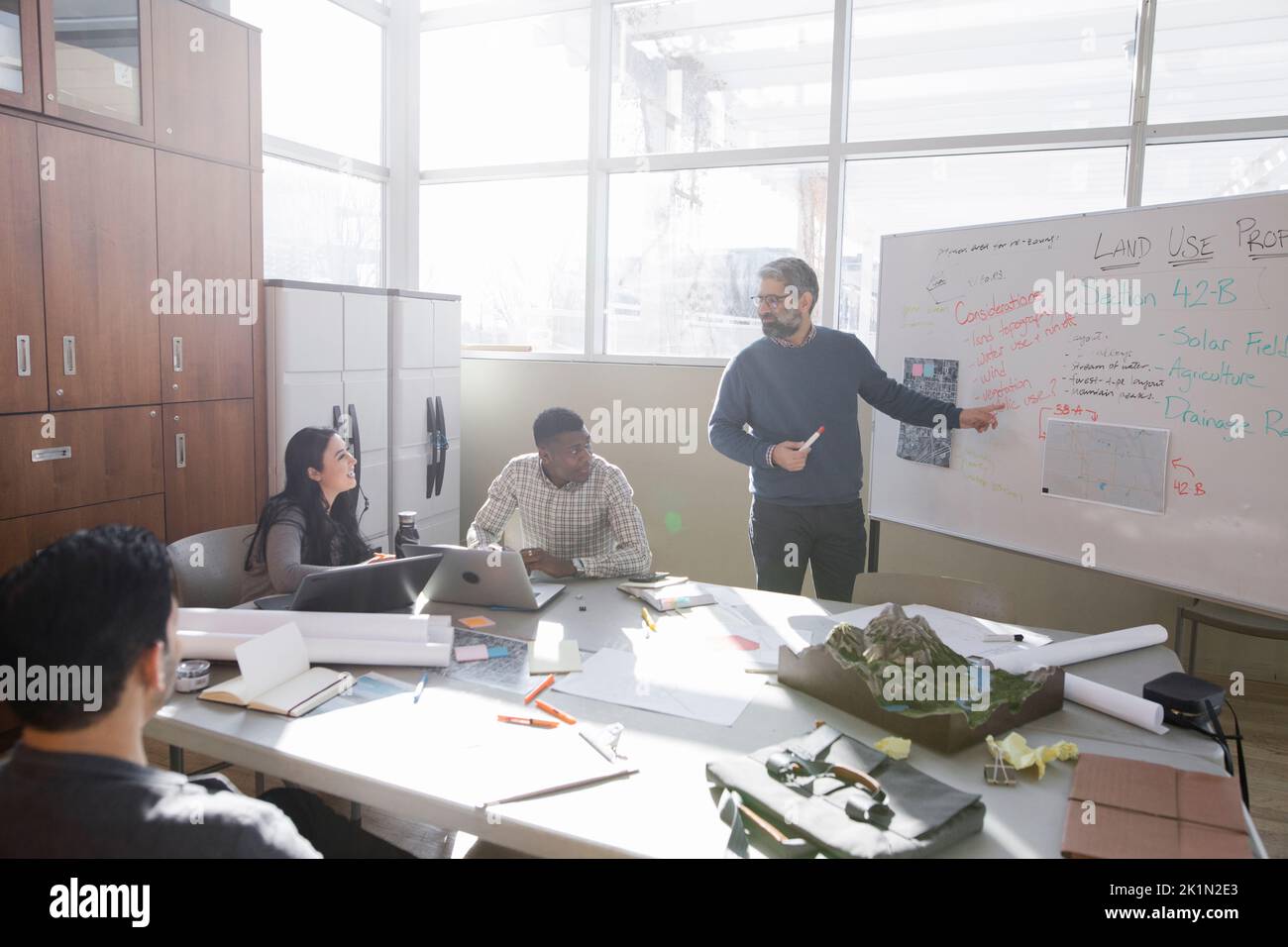 Land use planners working in community center Stock Photo Alamy