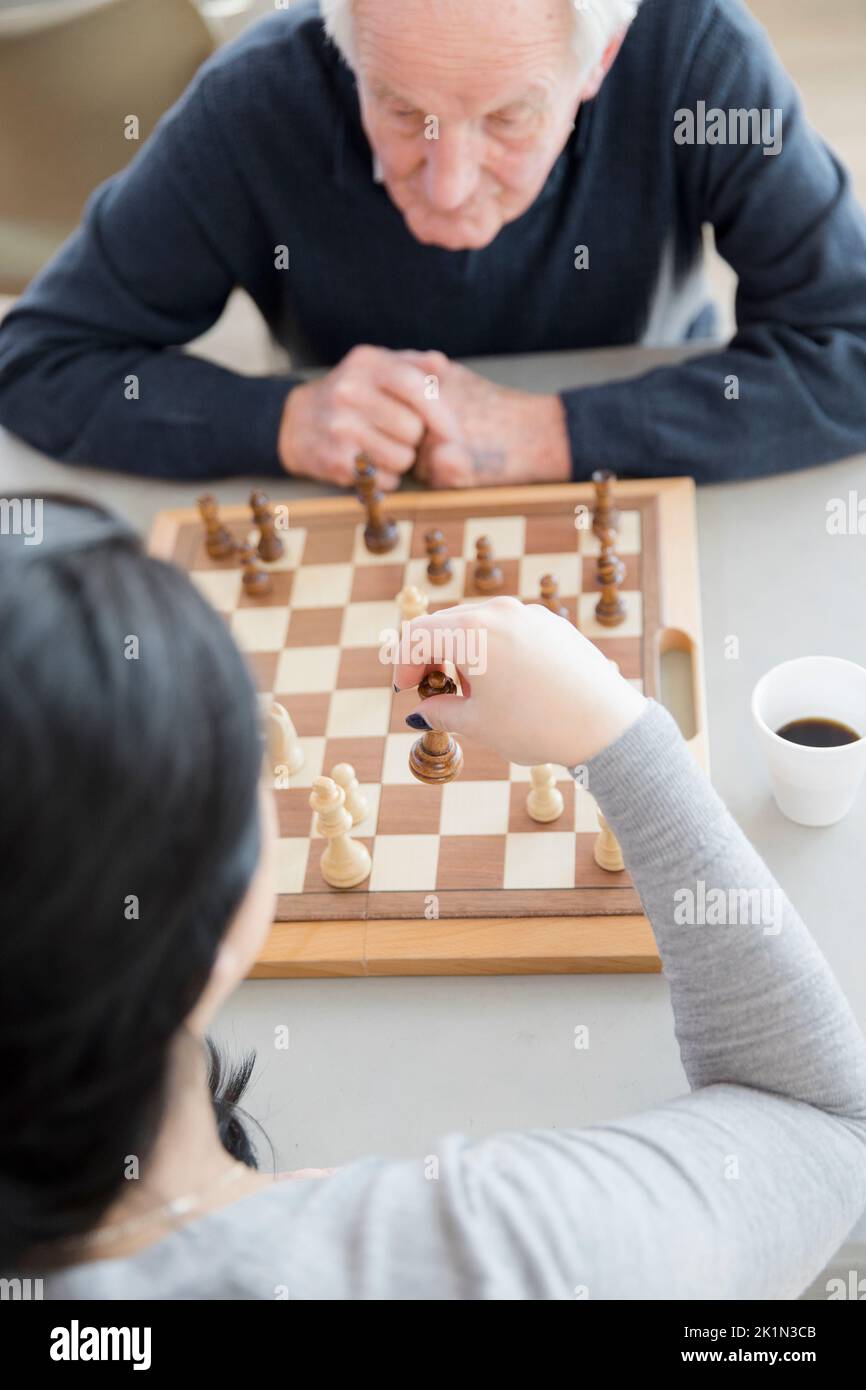 Two business women play chess hi-res stock photography and images - Alamy