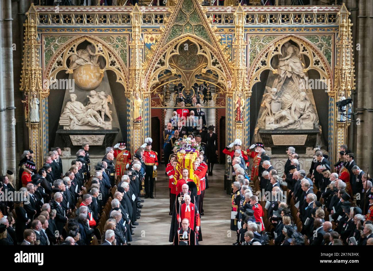 King Charles III and members of the royal family follow behind the