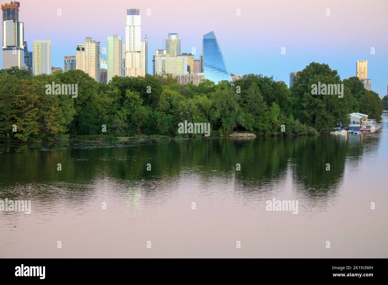 Austin TX skyline at dusk a view - Austin Tx Skyline At Dusk A View From The Bridge Over The Colorado River On The Ann And Roy Butler Hike And Bike Trail And Boardwalk At Lady Bird Lake 2K1N3MH 