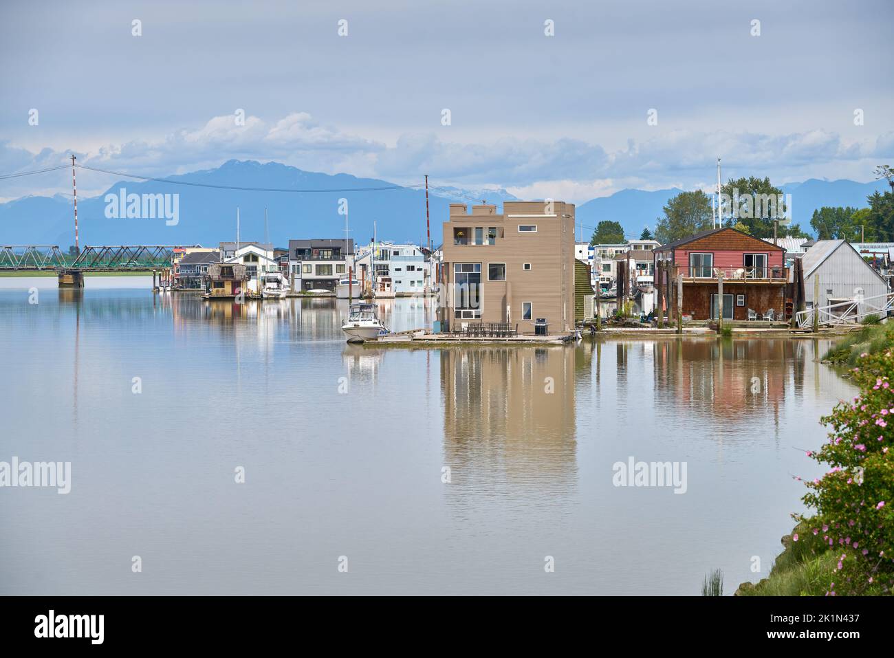 Floating Boat Houses Delta BC. Floating Boat Houses on the Fraser River in Ladner BC, Canada. Stock Photo