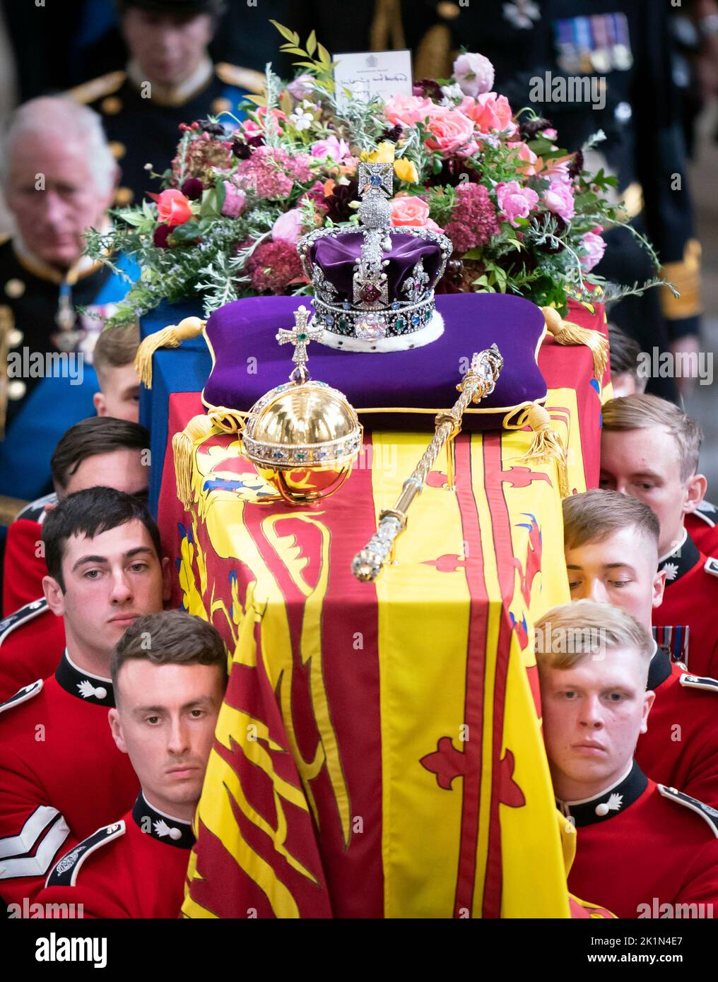 King Charles III and members of the royal family follow behind the