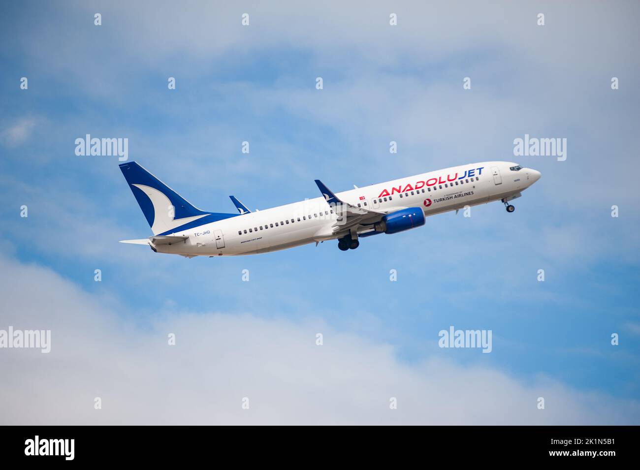 30.08.2022, Berlin, Germany, Europe - An AnadoluJet Boeing 737-800 passenger aircraft takes off from Berlin Brandenburg Airport BER. Stock Photo
