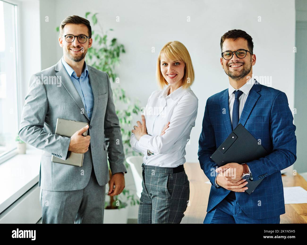 young business people meeting office teamwork corporate portrait beautiful businesswoman businessman colleague posing businesspeople Stock Photo