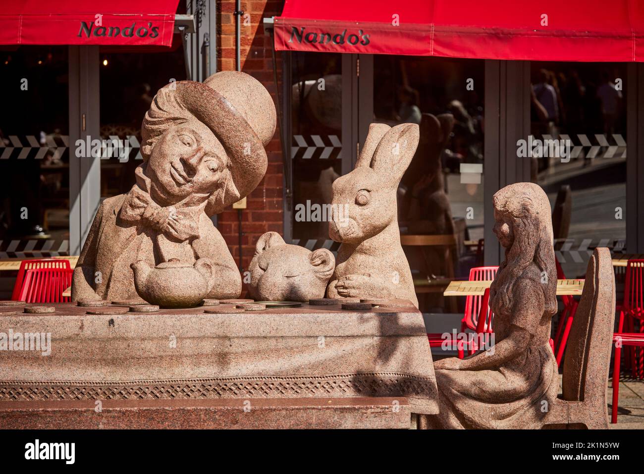 Warrington town centre Warrington Old Fish Market, Alice in Wonderland Stone Statue Sculpture Stock Photo
