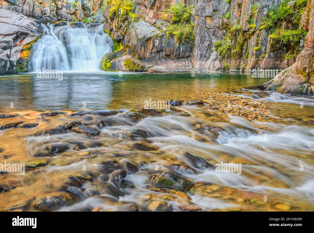 waterfall along tenderfoot creek in the little belt mountains near white sulphur springs