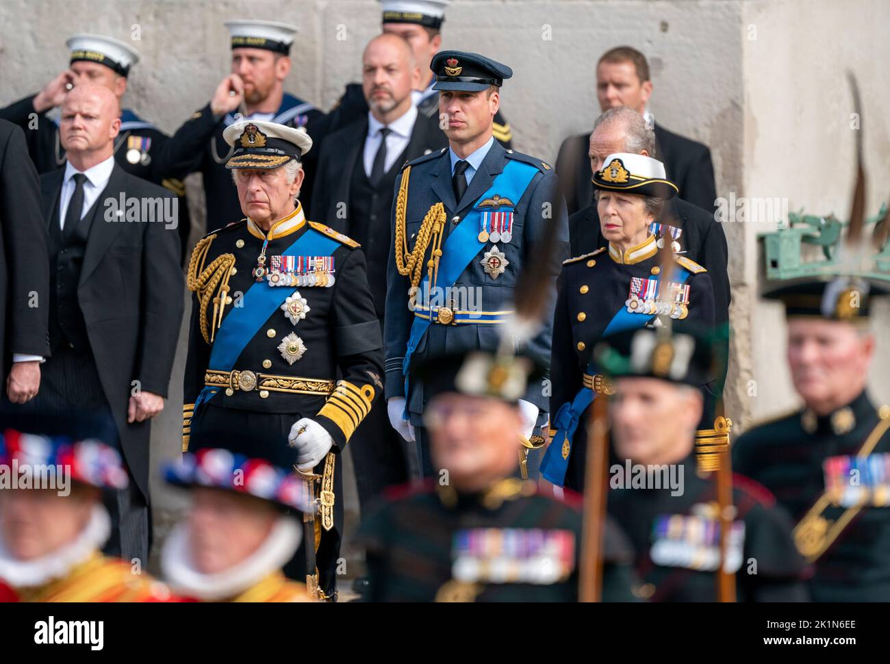 King Charles III, the Prince of Wales and the Princess Royal look on as the State Gun Carriage carrying the coffin of Queen Elizabeth II arrives at Wellington Arch during the Ceremonial Procession following her State Funeral at Westminster Abbey, London. Stock Photo