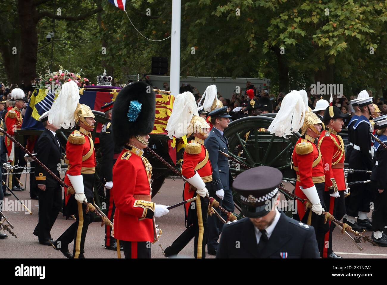 London, UK, 19th September 2022. British and Commonwealth military representations followed the courtege. Queen Elizabeth II coffin is carried on a gun carriage on The Mall on its way to Windsor. Credit: Uwe Deffner / Alamy Live News Stock Photo