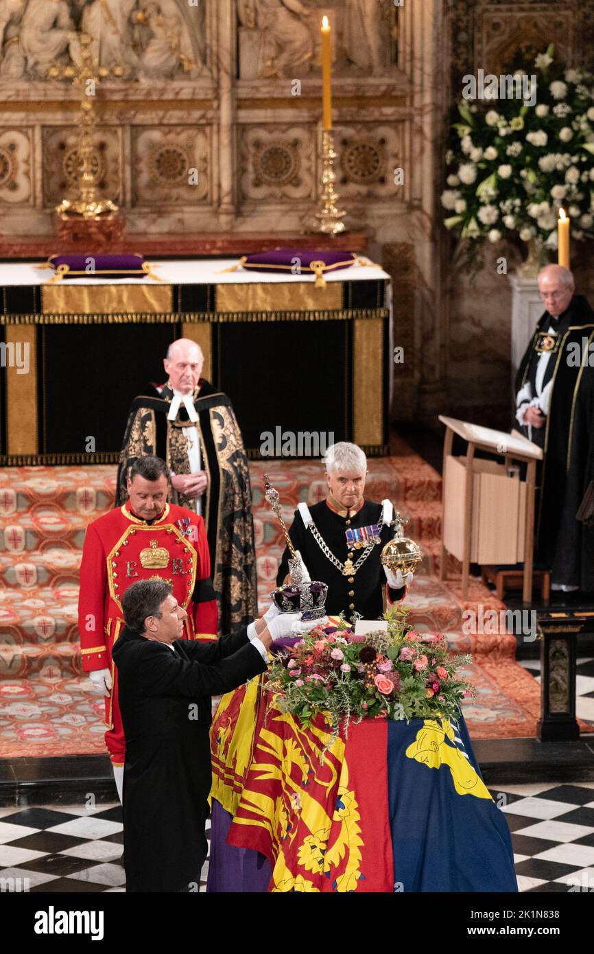 The Imperial State Crown is removed from the coffin of Queen Elizabeth II during the Committal Service at St George's Chapel in Windsor Castle, Berkshire. Picture date: Monday September 19, 2022. Stock Photo