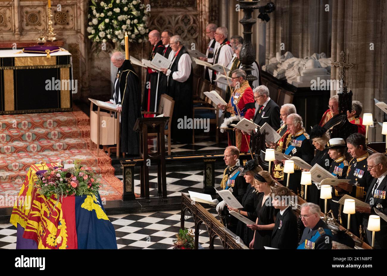 The coffin of Queen Elizabeth II, draped in the Royal Standard with the Imperial State Crown and the Sovereign's orb and sceptre, during the Committal Service at St George's Chapel in Windsor Castle, Berkshire. Picture date: Monday September 19, 2022. Stock Photo