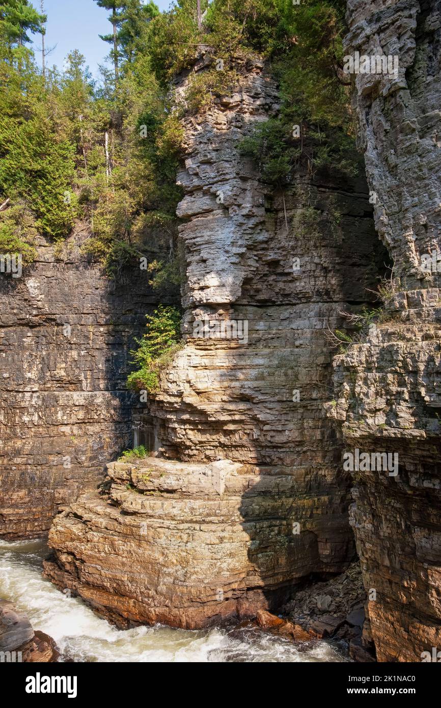 Stacked stone cliffside at Ausable Chasm in upstate NY. Stock Photo
