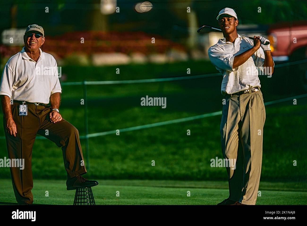 Tiger Woods with Butch Harmon at the 2000 World Golf Championships-NEC Invitational. Stock Photo